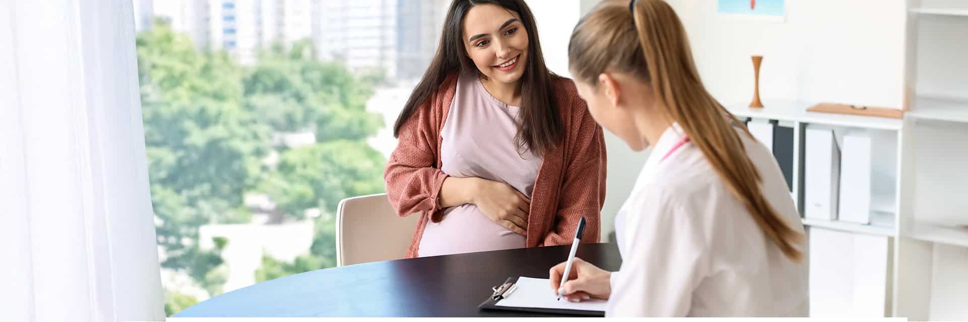 drug and alcohol addiction treatment pregnant patient speaking with doctor